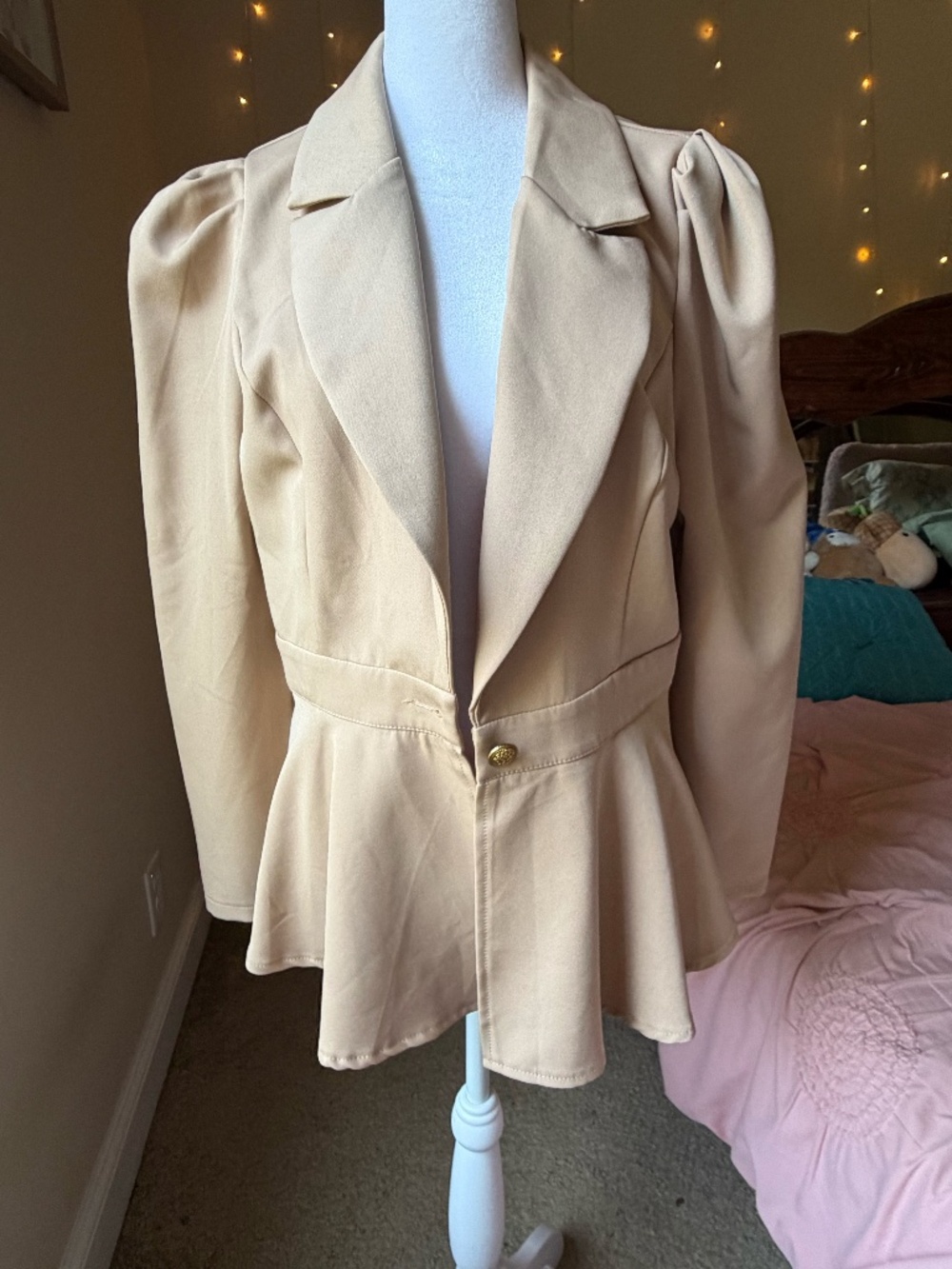 Neutral peplum blazer
